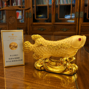Handcrafted Golden Arowana Feng Shui statue symbolizing wealth, business success, team harmony, and prosperity