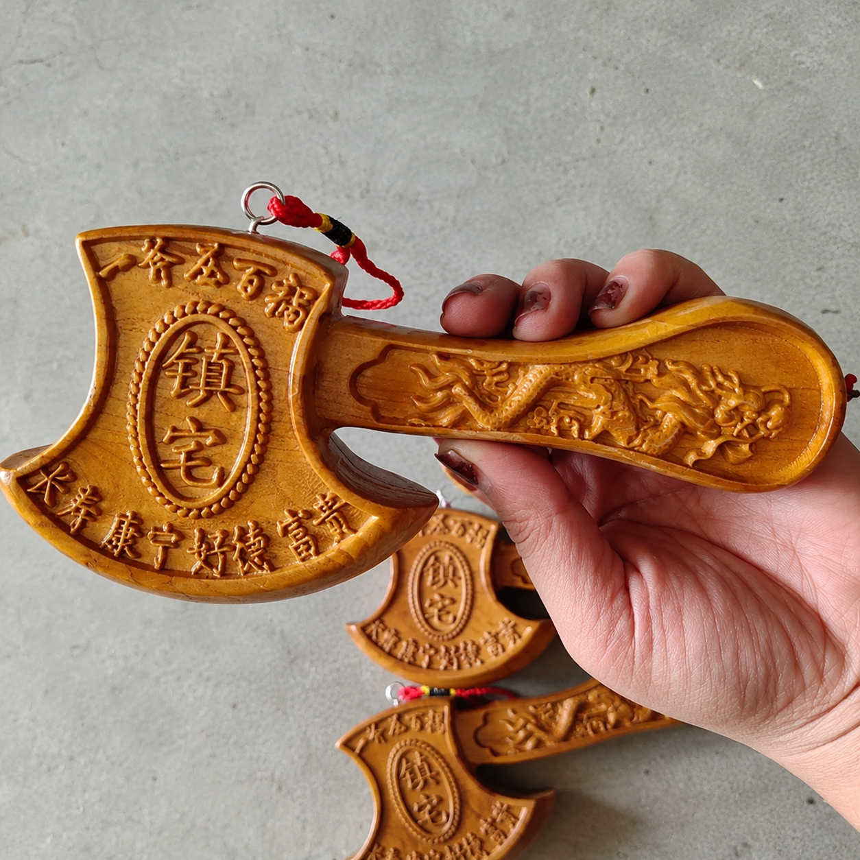 Peach Wood Feng Shui Axe Handcrafted Peach Wood Feng Shui Axe symbolizing home protection, positive energy, and traditional Eastern blessings