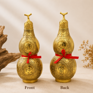 Handcrafted consecrated brass Wu Lou Feng Shui gourd displayed for bathroom protection and energy balance.